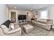 Cozy living room with hardwood floors, comfortable seating, and an open layout at 7514 Highway 205 Hwy, Marshville, NC 28103