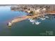 Stunning aerial view of waterfront property with private docks, gazebo, and luxurious lakeside homes at 753 Southwest Dr, Davidson, NC 28036