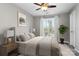 Inviting bedroom with warm decor, bedside tables, and a sunny window view, creating a cozy retreat at 753 Southwest Dr, Davidson, NC 28036