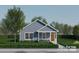 Charming single-story home with light blue siding, white trim, and a cozy front porch at 0 Shaver St # 3, Salisbury, NC 28144