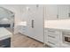 White kitchen with stainless steel appliances and ample storage at 01 Mcfalls Dr, Indian Land, SC 29707