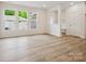Bright living room with lots of natural light, recessed lighting, and a neutral color scheme at 10115 Mamillion Dr, Huntersville, NC 28078
