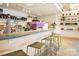 Stylish coffee bar features sleek seating, modern appliances, and beautifully displayed merchandise at 111 Verbena Ne St # 10, Charlotte, NC 28217
