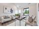 Home office featuring a stylish desk, comfortable seating, natural light, and contemporary decor at 111 Verbena Ne St # 10, Charlotte, NC 28217