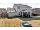 Spacious backyard features a screened porch and lush greenery, perfect for outdoor enjoyment at 1148 Mckee Farm Ln, Belmont, NC 28012