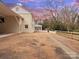 Exterior view of a house with a patio and a large yard at 122 Lansdowne Rd, Charlotte, NC 28270