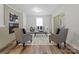 Comfortable living room with fireplace and access to the sunroom at 122 Lansdowne Rd, Charlotte, NC 28270
