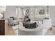 Cozy living room with natural light, neutral tones, and comfortable seating arrangement at 122 Lansdowne Rd, Charlotte, NC 28270