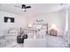 Spacious bedroom with a seating area, comfortable bed, and neutral decor at 124 Doncaster Dr, Mooresville, NC 28115