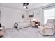 Bedroom with a cozy chair, a bed, and a modern dresser at 124 Doncaster Dr, Mooresville, NC 28115