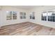 Sunny bedroom featuring light wood floors and large windows, offering great natural light at 132 Elizabeth Hearth Rd, Mooresville, NC 28115