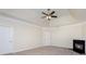 Spacious main bedroom with a tray ceiling, fireplace, and neutral carpet at 132 Elizabeth Hearth Rd, Mooresville, NC 28115