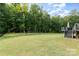 Large grassy backyard with soccer goals, providing ample play space at 1320 Torrens Dr, Wesley Chapel, NC 28110