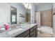 Bathroom with double vanity and a shower/tub combo at 1320 Torrens Dr, Wesley Chapel, NC 28110