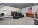 Home theater with tiered seating and wet bar at 1320 Torrens Dr, Wesley Chapel, NC 28110