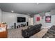 Home theater with large screen and reclining seats at 1320 Torrens Dr, Wesley Chapel, NC 28110