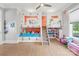 Spacious ' bedroom with custom built-in bed, toy storage, and ample natural light at 15700 Youngblood Rd, Charlotte, NC 28278