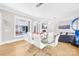 Dining room featuring an open floor plan, glass table, and open view of the living room at 15700 Youngblood Rd, Charlotte, NC 28278