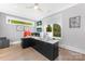 Well-lit office space with a large desk, multiple monitors, and modern design at 15700 Youngblood Rd, Charlotte, NC 28278