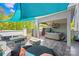 Relaxing patio with hot tub, lounge area, and outdoor entertainment space at 15700 Youngblood Rd, Charlotte, NC 28278