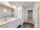 Bathroom with double vanity, quartz countertop, and walk-in closet at 1715 Wooten Way, Bessemer City, NC 28016