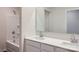 Bathroom boasts a double vanity and a shower/tub combo at 1715 Wooten Way, Bessemer City, NC 28016