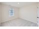 Simple bedroom with neutral wall paint and carpet flooring at 1715 Wooten Way, Bessemer City, NC 28016