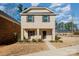 Brick two-story house with a front yard and walkway at 3010 Lisburn St, Mint Hill, NC 28227