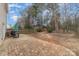 Large fenced backyard with patio area perfect for entertaining, and wooded perimeter for privacy at 3302 Cole Mill Rd, Charlotte, NC 28270