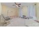 bedroom with play bed, curtains and rocker at 3302 Cole Mill Rd, Charlotte, NC 28270