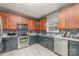 Updated kitchen with stainless steel appliances and ample counter space at 3302 Cole Mill Rd, Charlotte, NC 28270