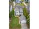 Aerial view of home with a well-kept lawn and backyard patio, showcasing the property's outdoor appeal at 375 Montibello Dr, Mooresville, NC 28117