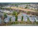 Picturesque aerial view of a residential neighborhood showcasing neat homes and green spaces at 375 Montibello Dr, Mooresville, NC 28117