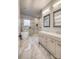 Bathroom showcasing double vanity, soaking tub, and glass enclosed shower at 375 Montibello Dr, Mooresville, NC 28117