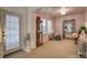 Bright bedroom with a large window, a built-in display case, and a comfortable seating area at 375 Montibello Dr, Mooresville, NC 28117