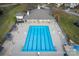 Aerial shot of community pool with lap lanes, surrounded by lounge chairs and shaded seating areas at 375 Montibello Dr, Mooresville, NC 28117