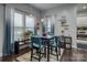 Cozy dining area features a table with seating for four, natural light, and stylish decor at 375 Montibello Dr, Mooresville, NC 28117
