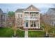 Charming two-story home with a welcoming front porch and second story balcony, perfect for enjoying the outdoors at 375 Montibello Dr, Mooresville, NC 28117