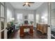 Inviting office with hardwood floors, natural light from large windows, and classic furnishings for a comfortable workspace at 375 Montibello Dr, Mooresville, NC 28117