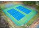 Aerial view of community tennis and basketball courts, providing recreational opportunities for residents at 375 Montibello Dr, Mooresville, NC 28117
