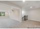 Finished basement with carpet and stairs at 4021 Harmattan Dr, Denver, NC 28037