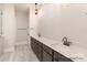 Bathroom featuring double sinks with quartz counters at 4021 Harmattan Dr, Denver, NC 28037