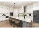 Spacious kitchen with a large island, pendant lighting, and modern appliances at 4021 Harmattan Dr, Denver, NC 28037