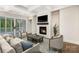 Living room featuring a fireplace, hardwood floors and ample seating at 4021 Harmattan Dr, Denver, NC 28037