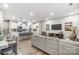 Open concept kitchen and living room with island and seating at 4114 Cheyney Park Dr, Charlotte, NC 28269