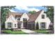 An elegant house with a brick exterior and neutral accent shutters featuring double garage, and well-manicured lawn at 722 Hillside Ave, Charlotte, NC 28209