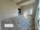 Unfinished flex room off living space with light-filled windows at 722 Hillside Ave, Charlotte, NC 28209