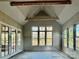 Bright sunroom with large windows and doors at 722 Hillside Ave, Charlotte, NC 28209