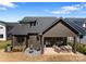 Aerial view of a backyard with an outdoor seating area and a patio at 831 Naples Dr, Davidson, NC 28036