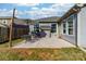 Backyard features a concrete patio with seating and grill area, plus a partially covered outdoor bar space at 1137 Mckee Farm Ln, Belmont, NC 28012